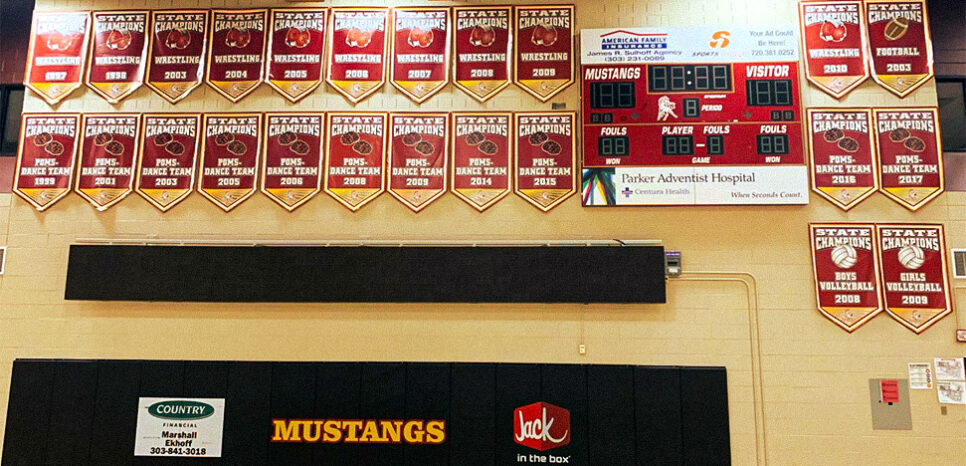 Gymnasium showcasing awards won by this high school program.