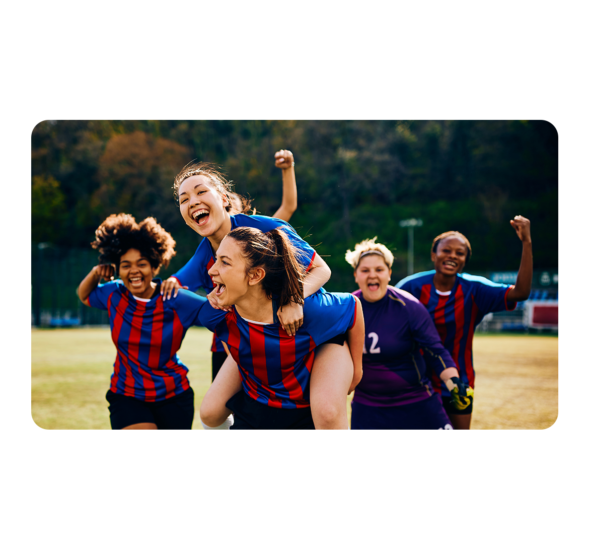 Girls soccer team celebrating
